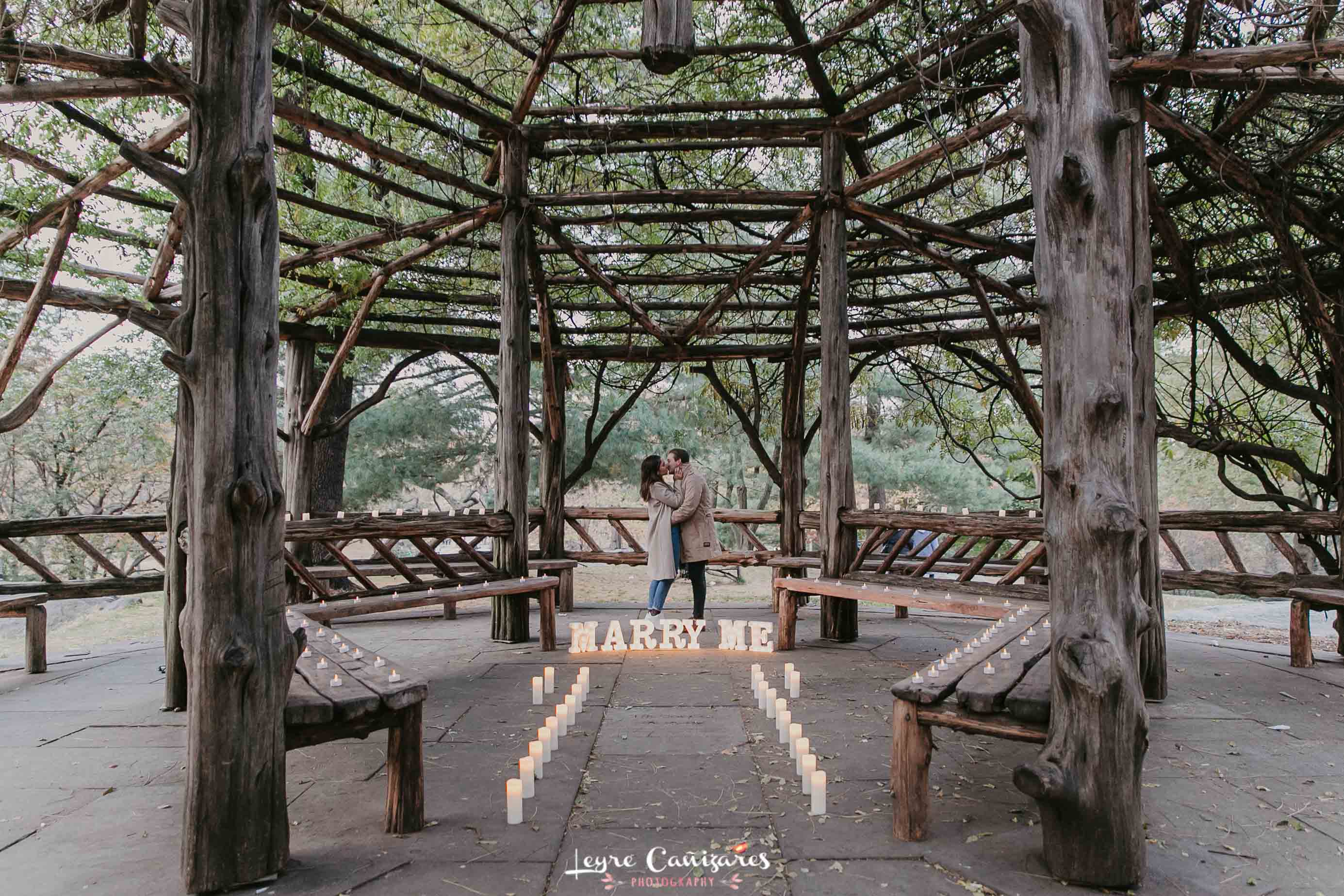 romantic surprise proposal at The Cop Cot with candles, central park