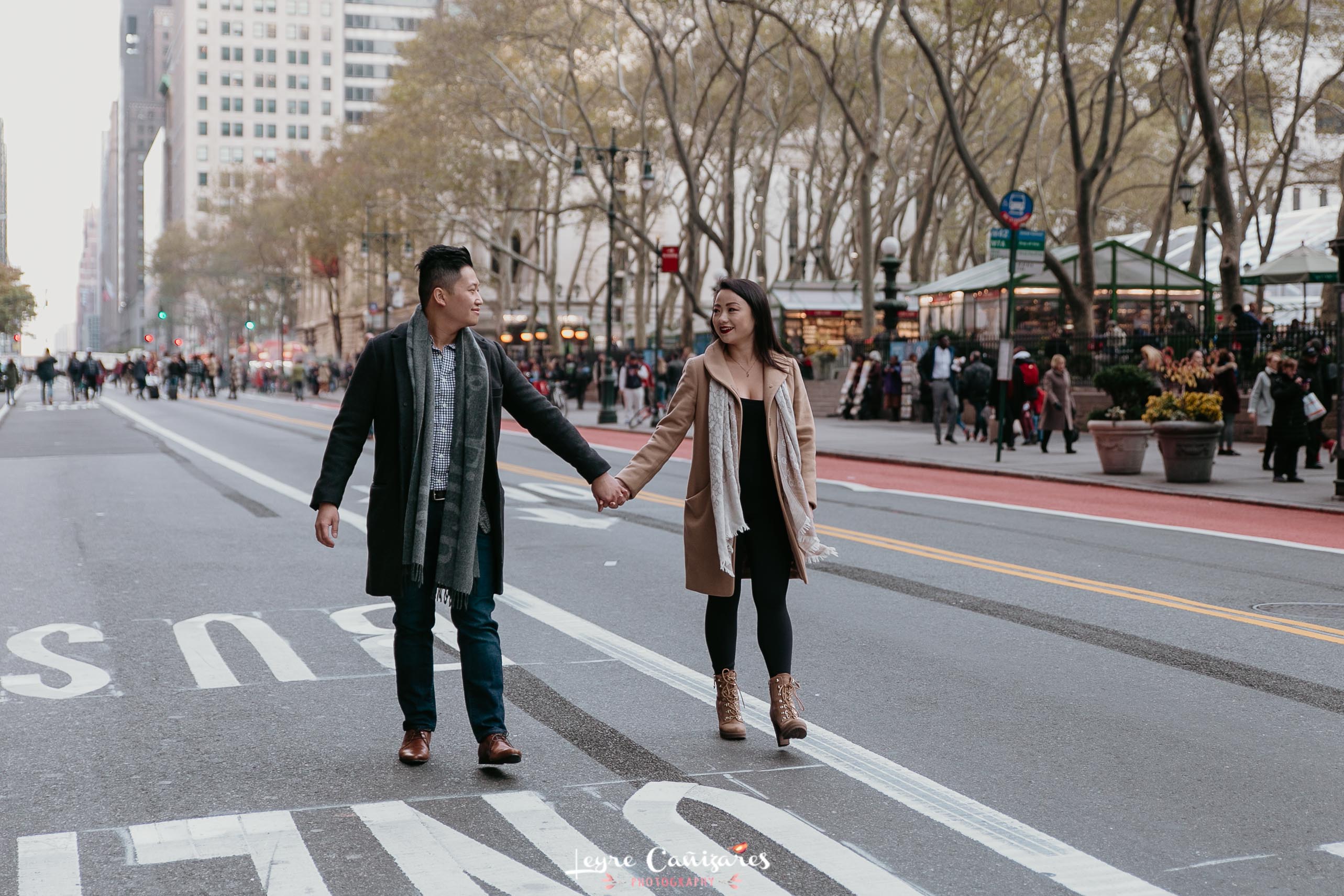 couple photos near bryant park in the middle of the road