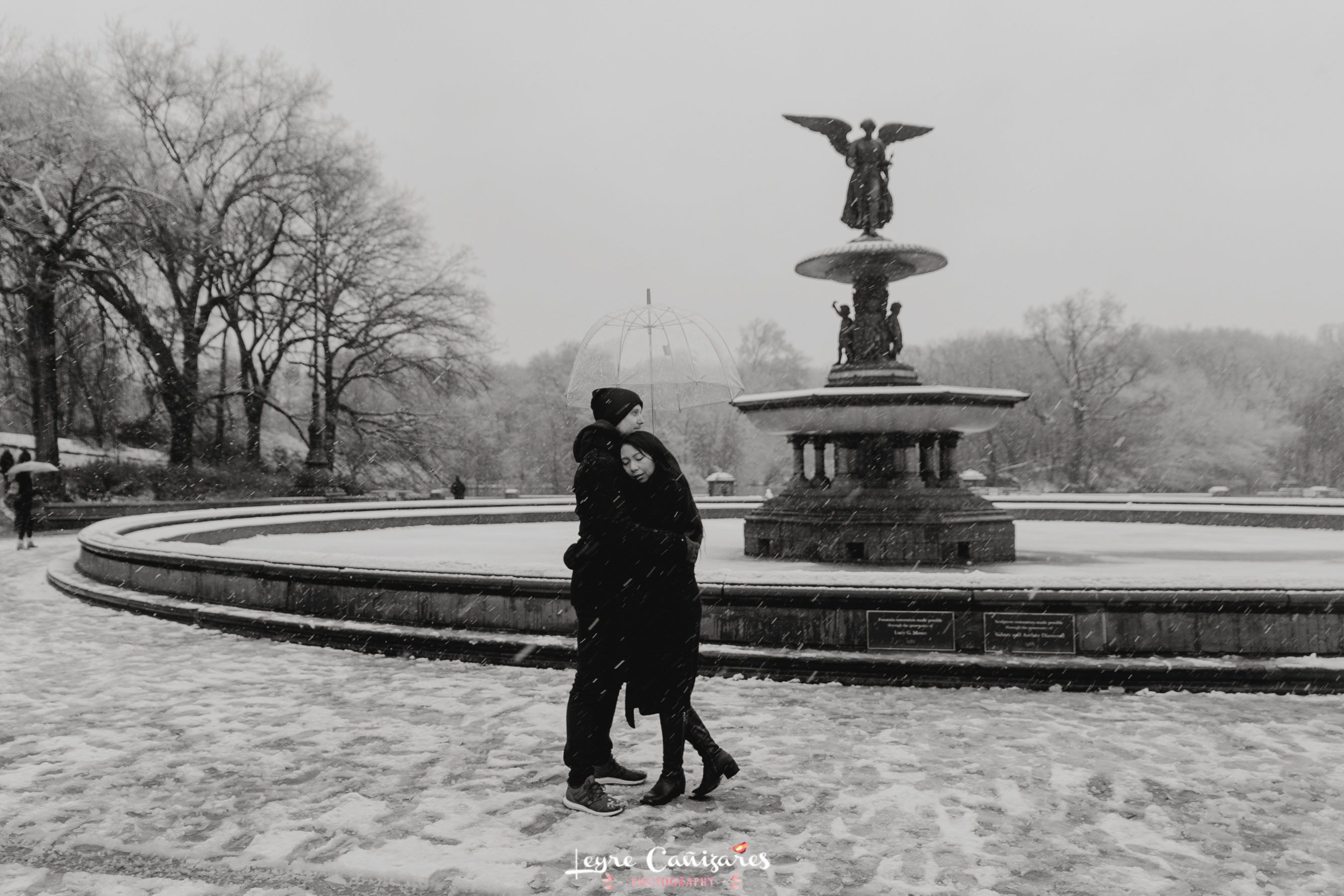 bethesda fountain engagement with snow