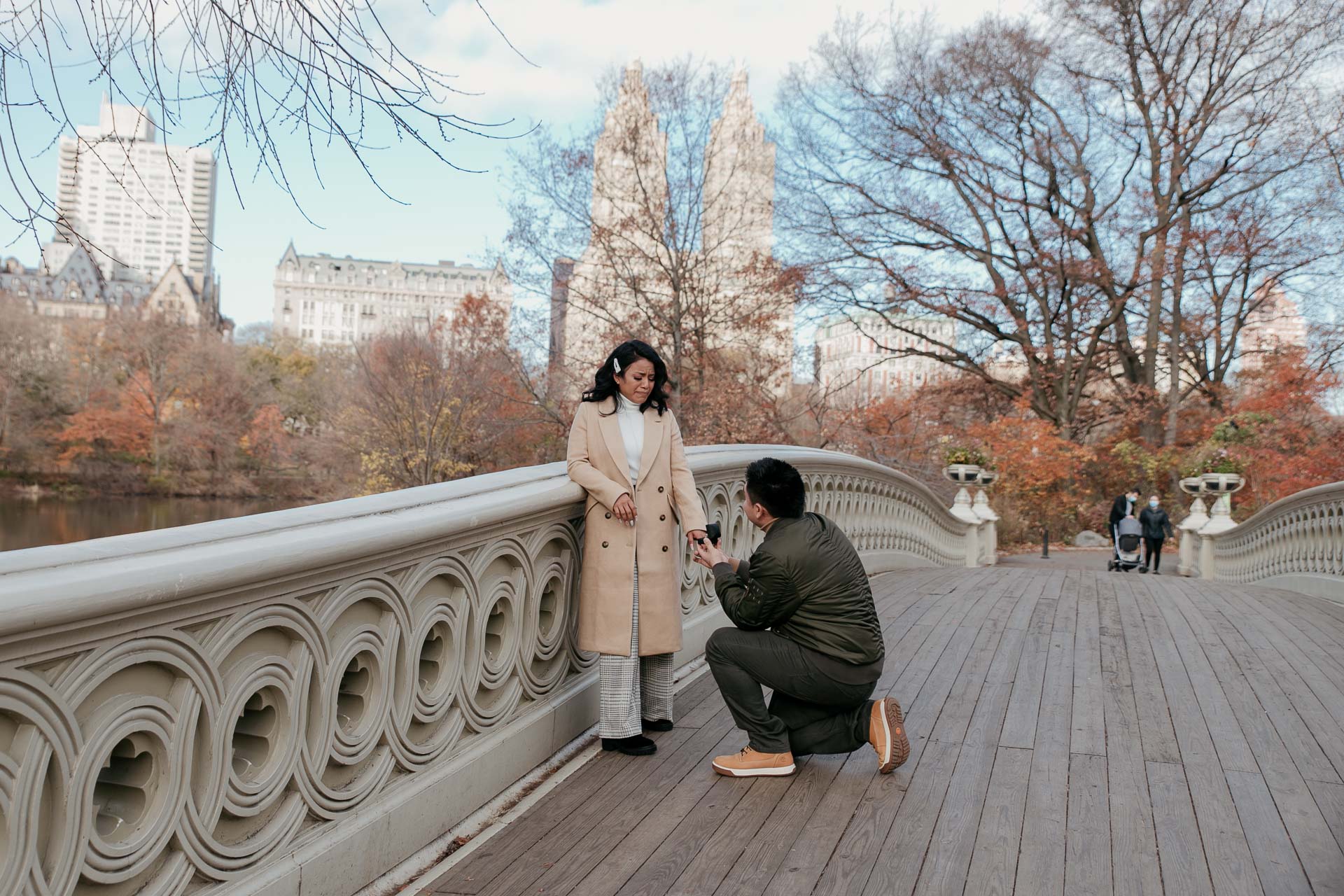 surprise proposal in the bow bridge, central park