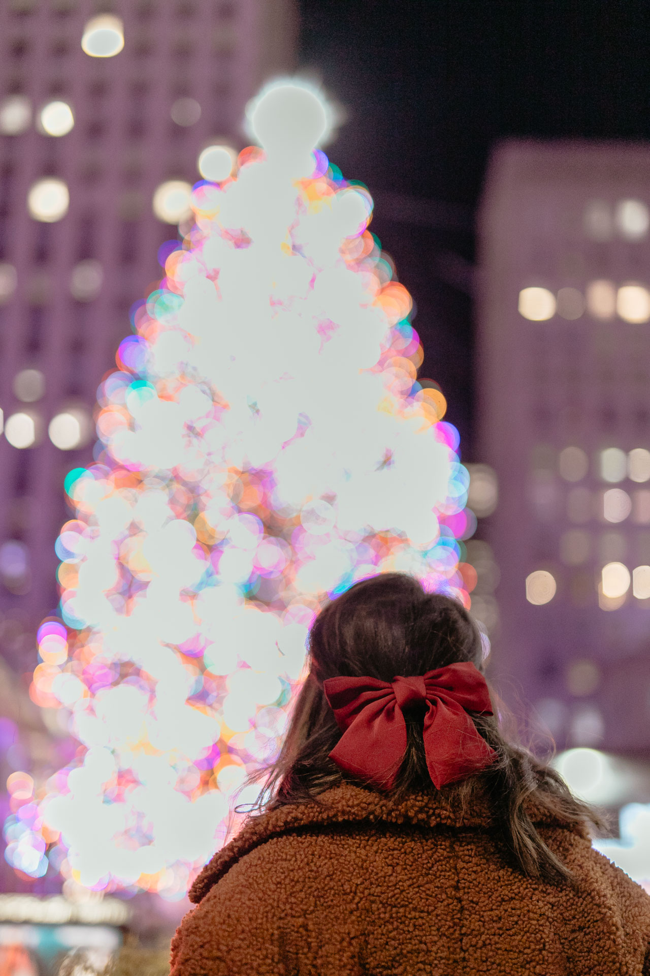 christmas portraits in the rockefeller tree, nyc