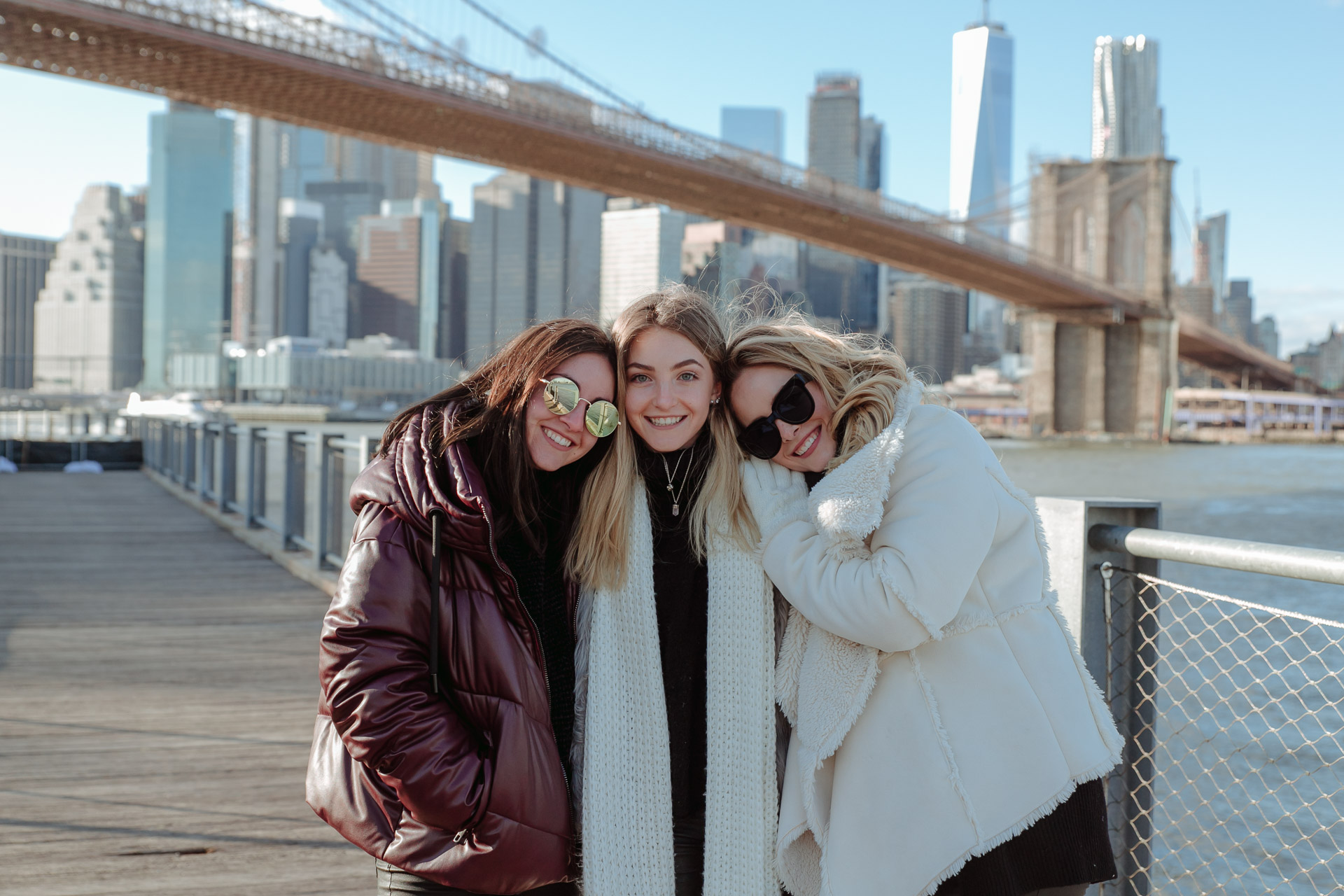 friends photoshoot in dumbo park with a professional phorographer