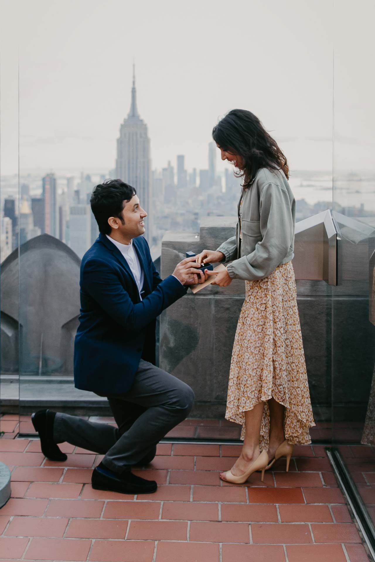 surprise proposal at top of the rock, new york city