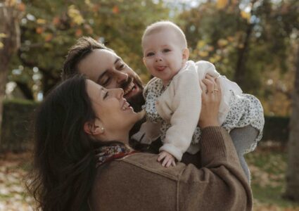 carmen's family photoshoot at the bethesda fountain and bow bridge in central park, new york